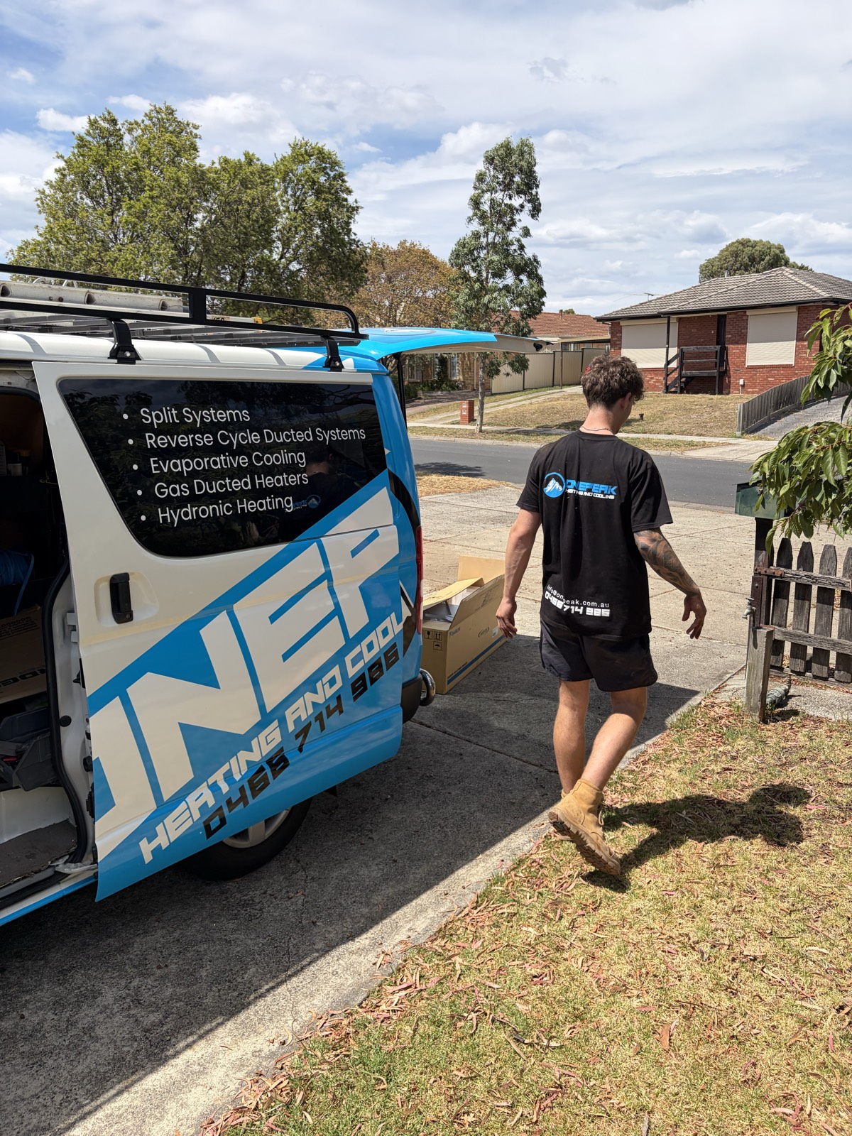 OnePeak technician arriving at a Melbourne job in the branded service van